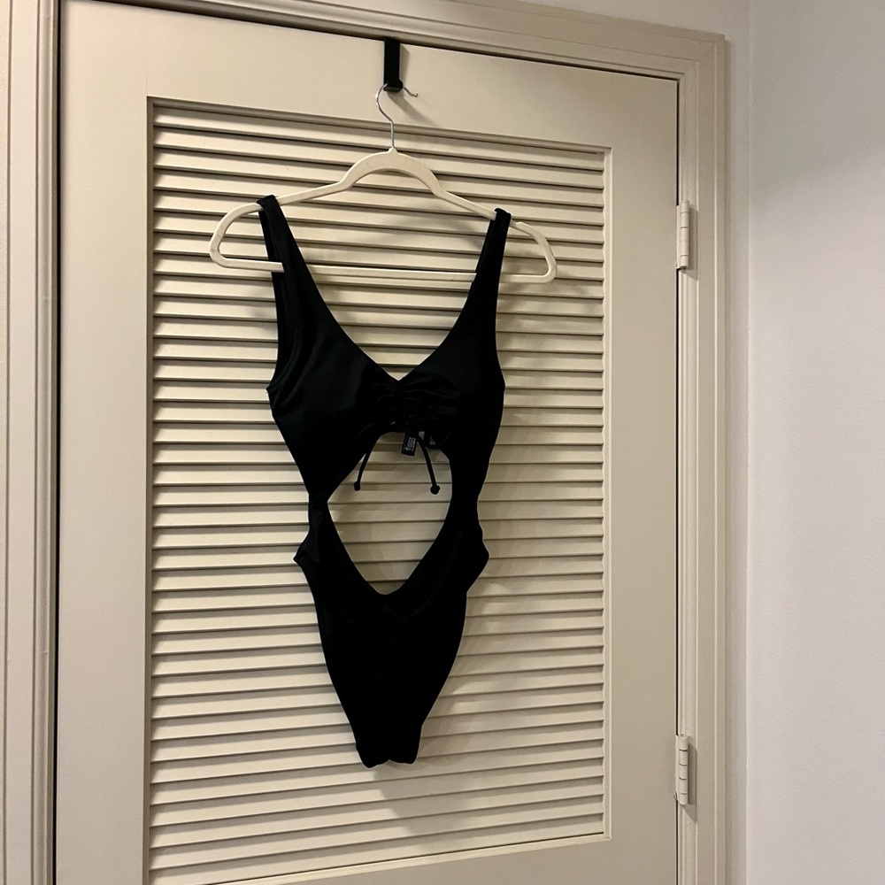 PINK cutout one piece swim suit size S in black